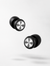 A clean product image showing a pair of black Roam Everyday™ Invisible Earplugs with brushed silver circular faceplates, floating on a soft white background with a subtle shadow.